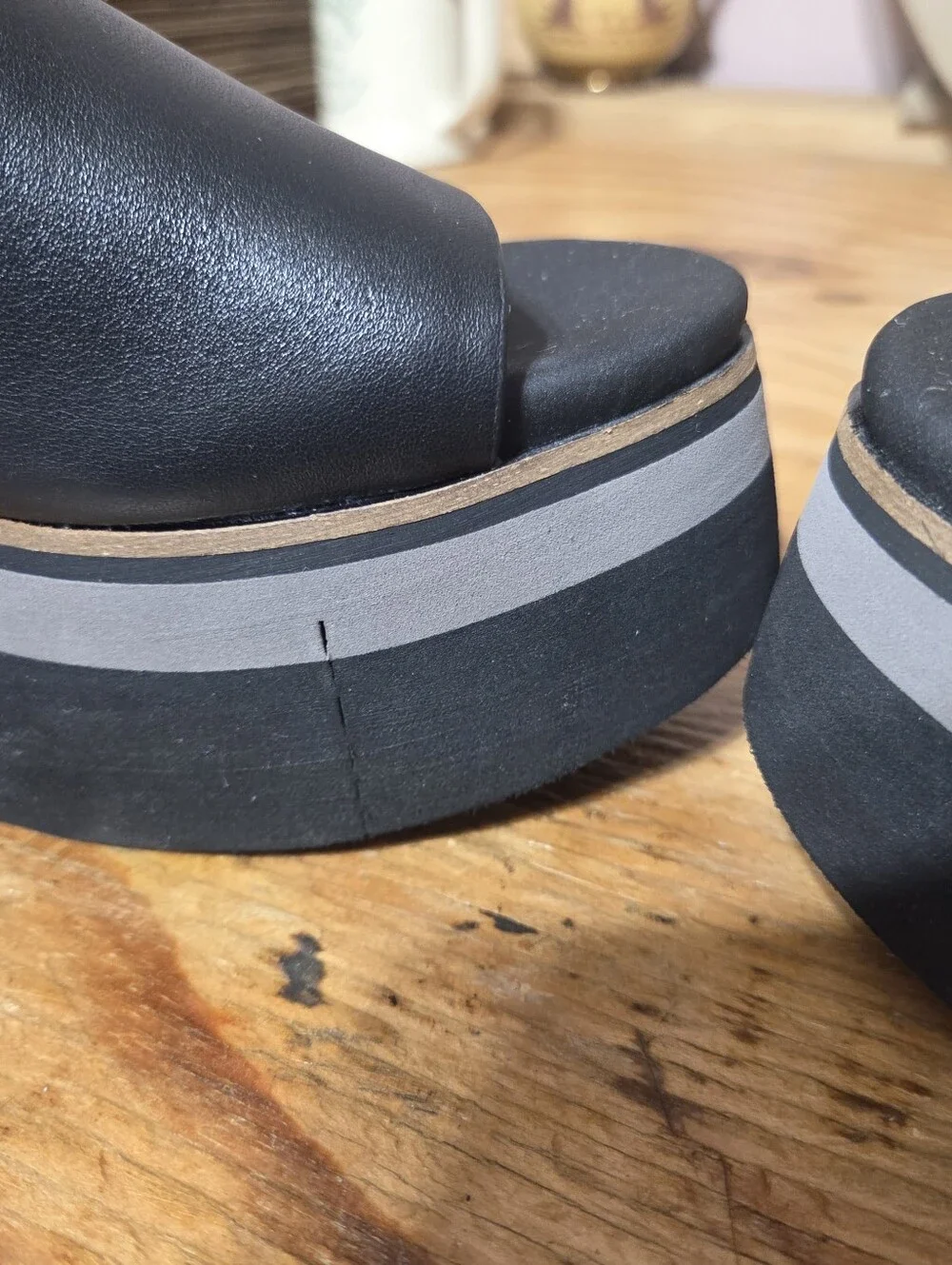 Naked Feet Shoes featuring a multi-tone gray and black stacked wedge Womens 9